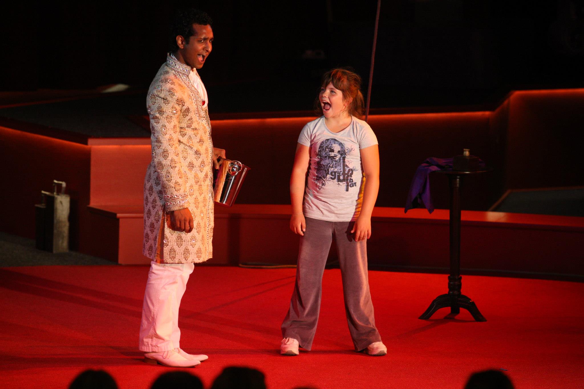 Sudesh with a young volunteer